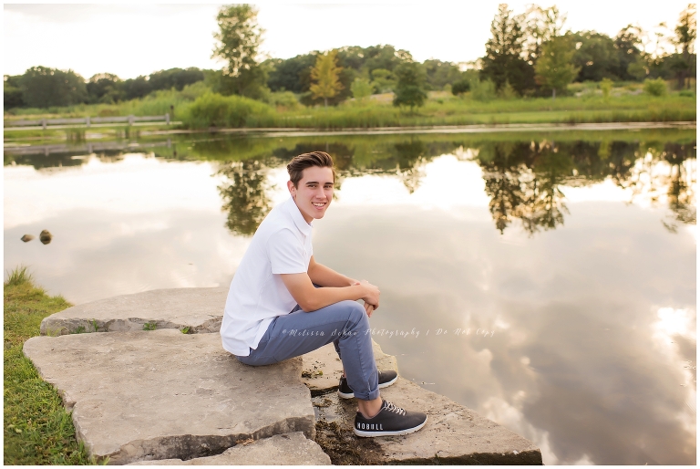 Senior high school guy outdoor photo session at lake from Barrington Illinois